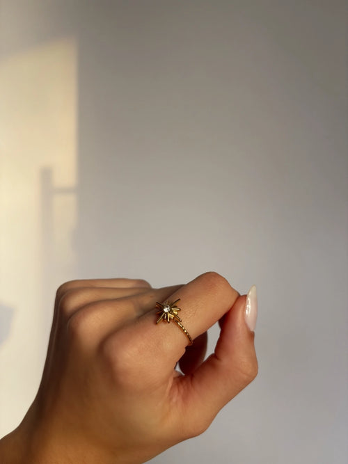 Bague étoile à huit branches avec strass