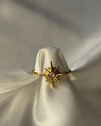 Bague étoile à huit branches avec strass