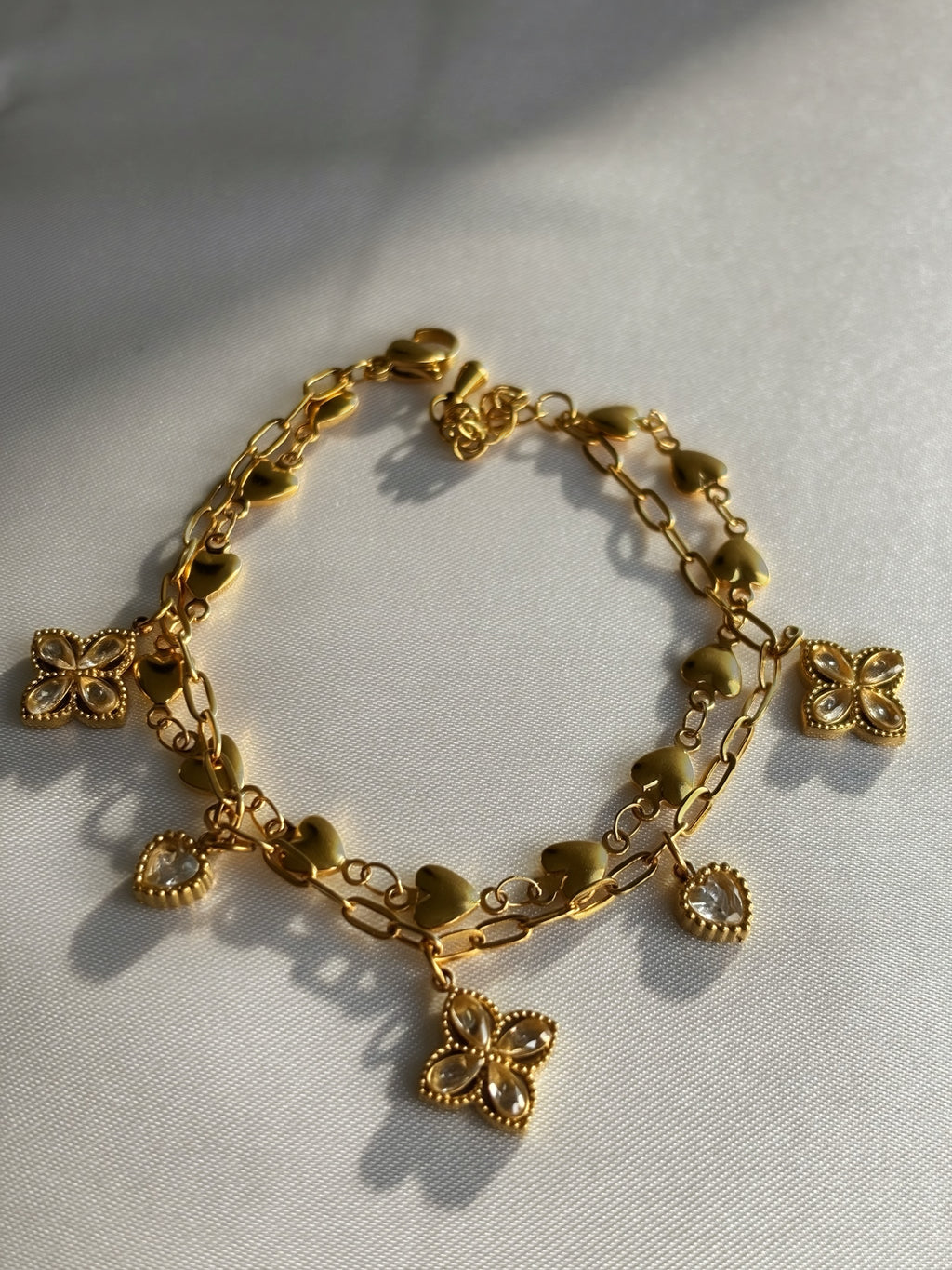 bracelet à deux maillons coeur et trèfles