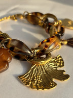 Bracelet en acier inoxydable et en résine effet léopard,