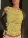 top asymétrique et drapé jaune