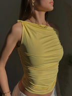 top asymétrique et drapé jaune