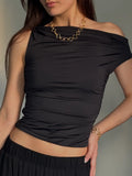 top asymétrique et drapé noir